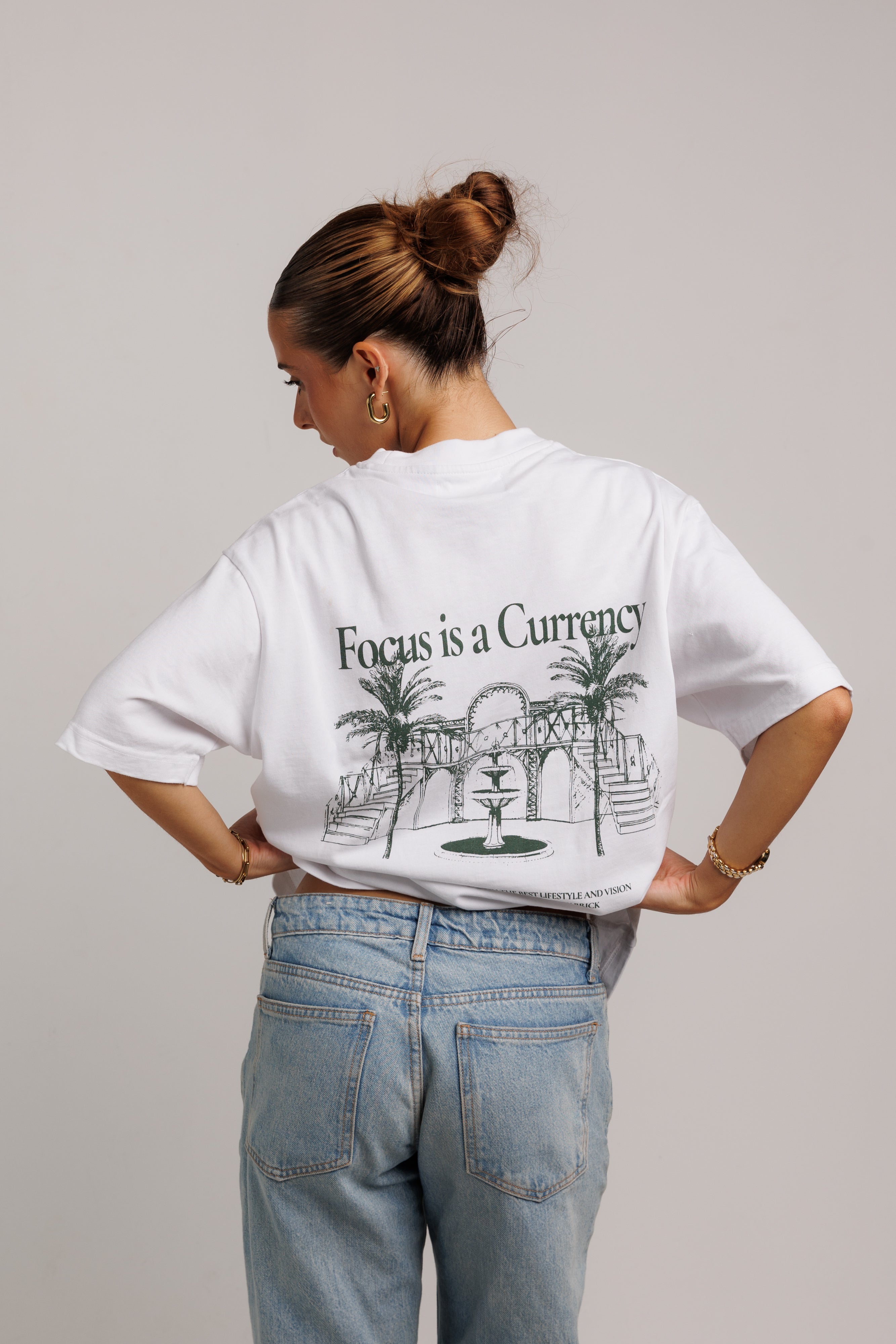 Focus is a Currency White T-shirt